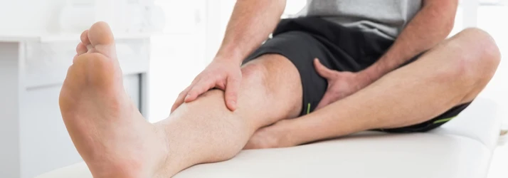 Chiropractic Ottawa ON Male With Leg Pain At Doctor